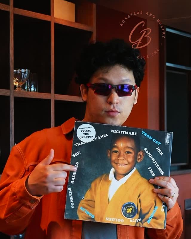 A guest with a vinyl record in the CBRB hall
