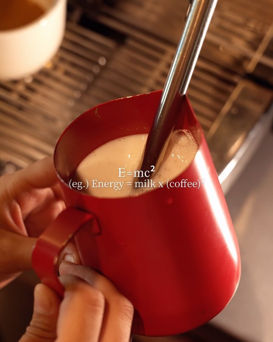 Steaming milk at the bar